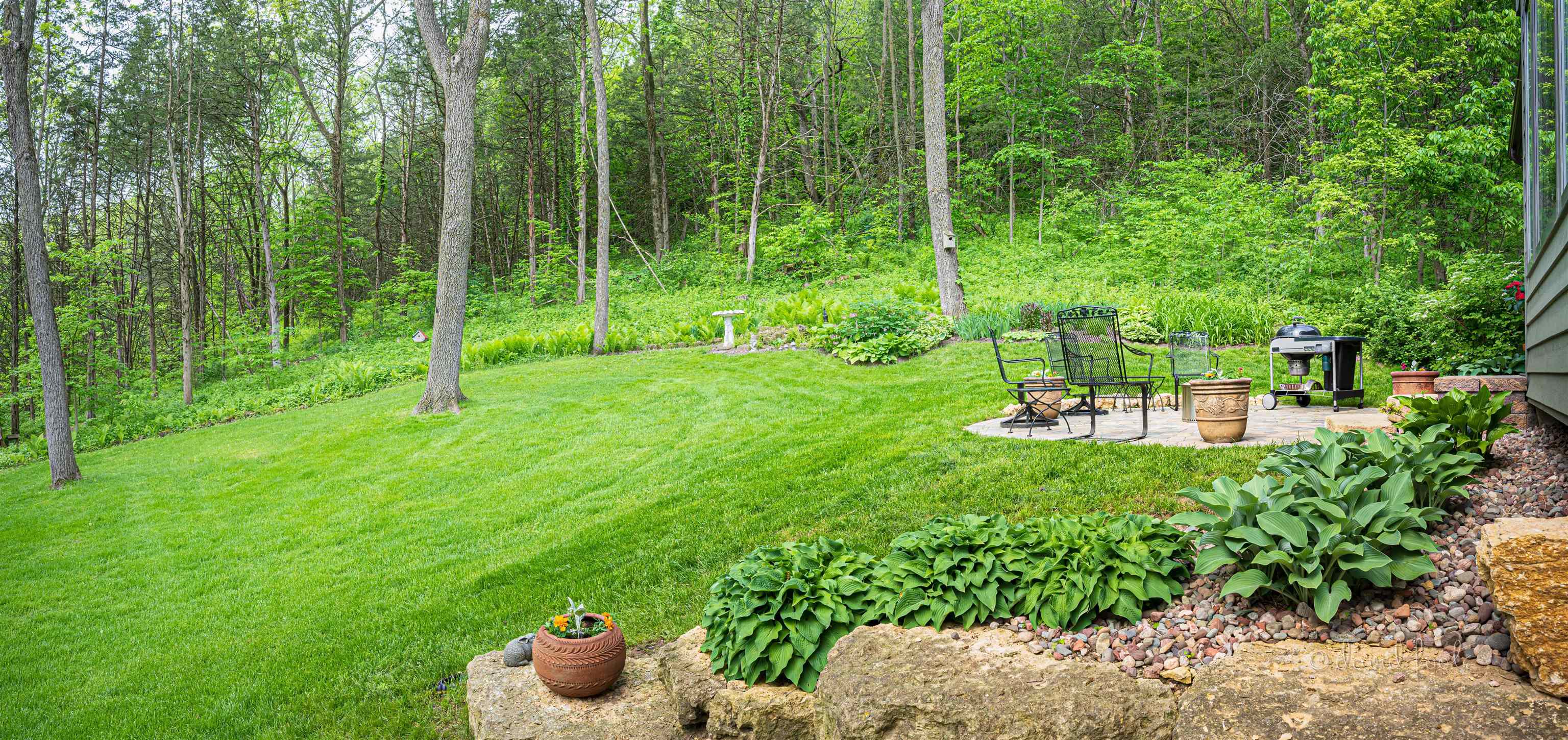 108 West Glen Hollow Road Galena, IL 61036 - Photo 50 of 51 a view of a chair and table in the garden