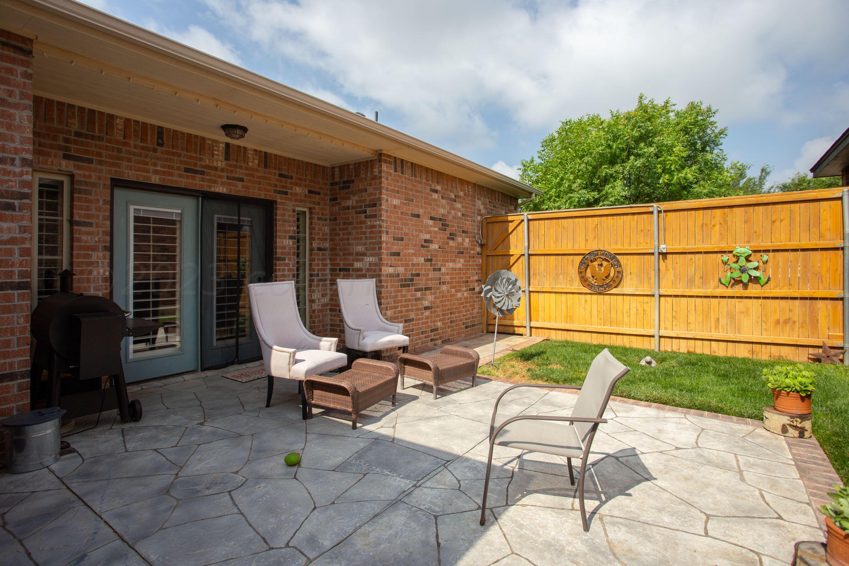 7105 Nick Street Amarillo, TX 79119 - Photo 23 of 24 a view of a chairs and table in the patio