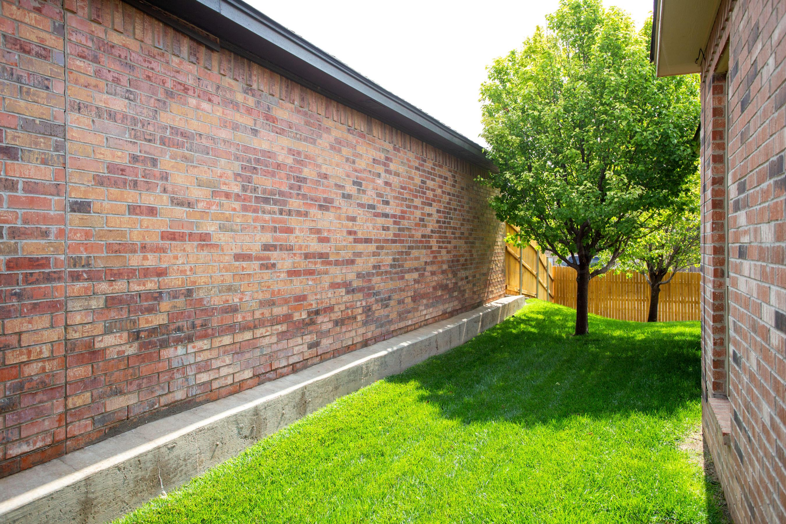 7105 Nick Street Amarillo, TX 79119 - Photo 24 of 24 a view of a backyard with a garden