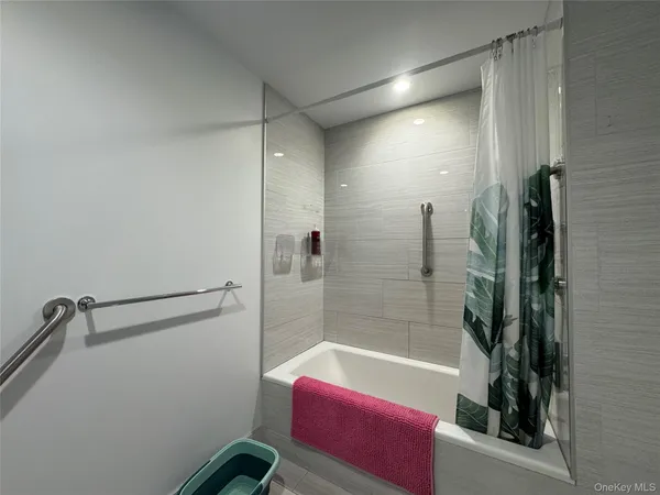 a bedroom with a bed and a table in it