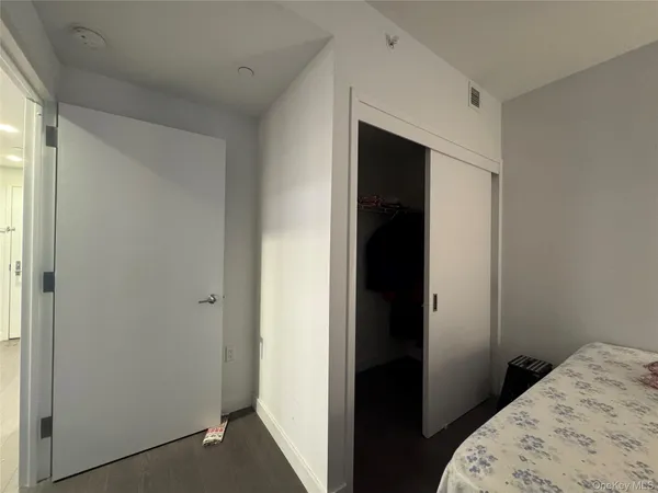 a balcony with hardwood wall and deck