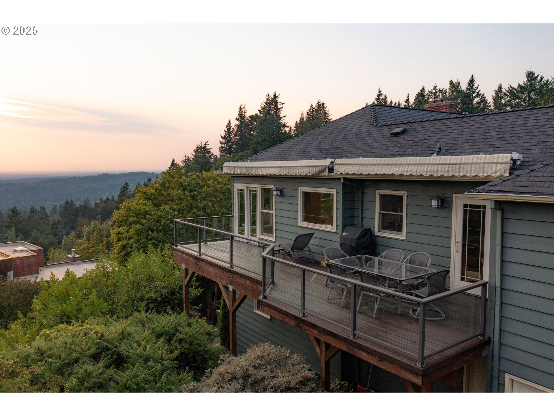 3250 Southwest Donner Way Court Portland, OR 97239 - Photo 14 of 48 a view of house with backyard and sitting area