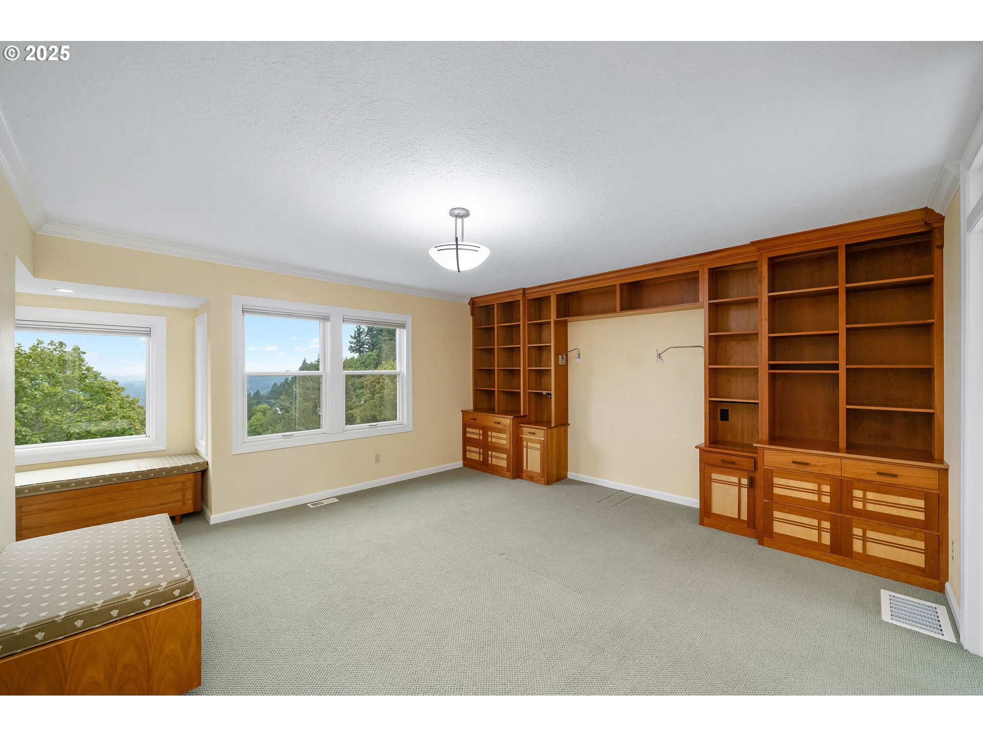 3250 Southwest Donner Way Court Portland, OR 97239 - Photo 15 of 48 a view of an empty room with a window