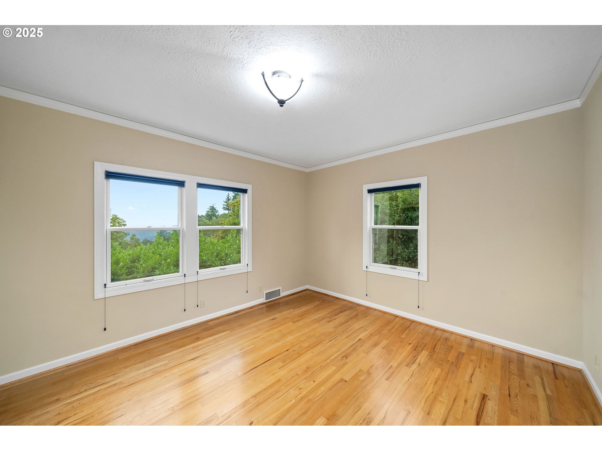 3250 Southwest Donner Way Court Portland, OR 97239 - Photo 24 of 48 a view of an empty room with a window