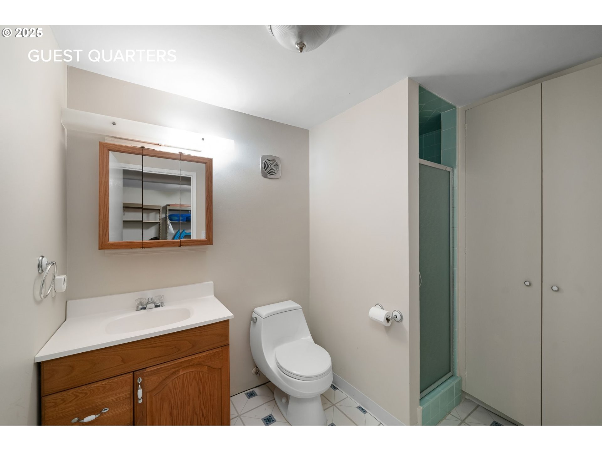 3250 Southwest Donner Way Court Portland, OR 97239 - Photo 33 of 48 a bathroom with a toilet a sink and mirror