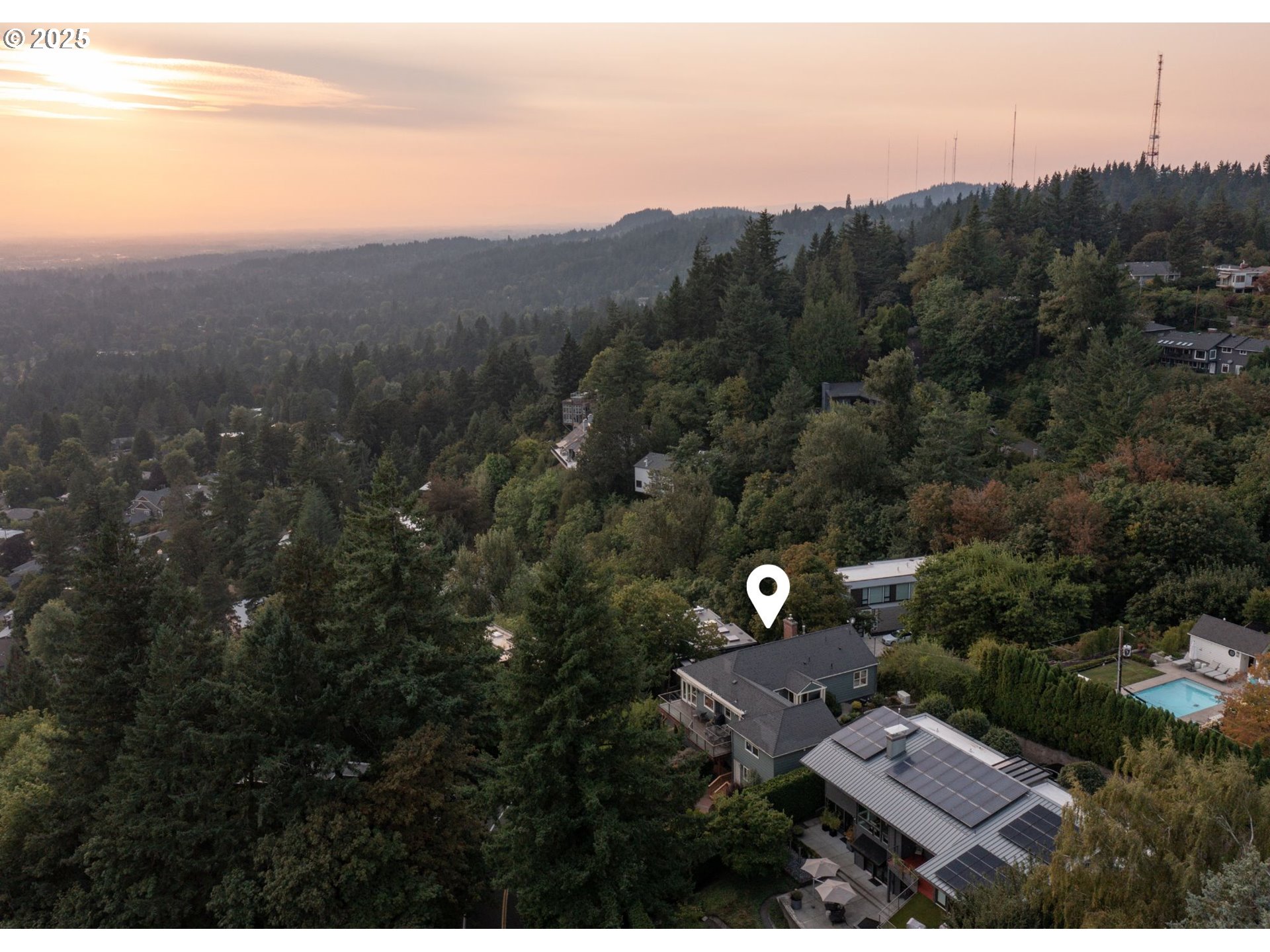 3250 Southwest Donner Way Court Portland, OR 97239 - Photo 35 of 48 a aerial view of a house with mountain view