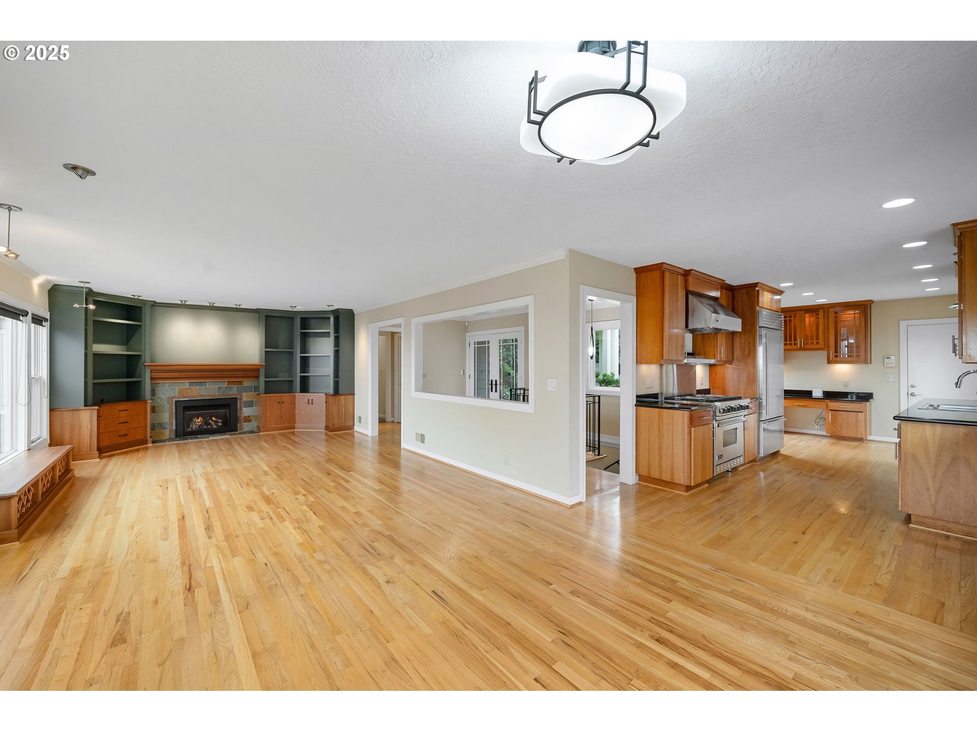 3250 Southwest Donner Way Court Portland, OR 97239 - Photo 6 of 48 a view of kitchen with furniture and wooden floor