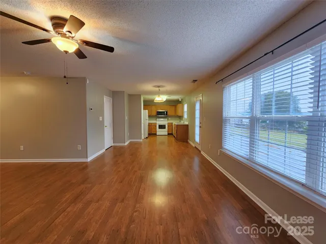 a view of a livingroom with a large window