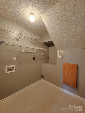 a view of a room with racks on the wall