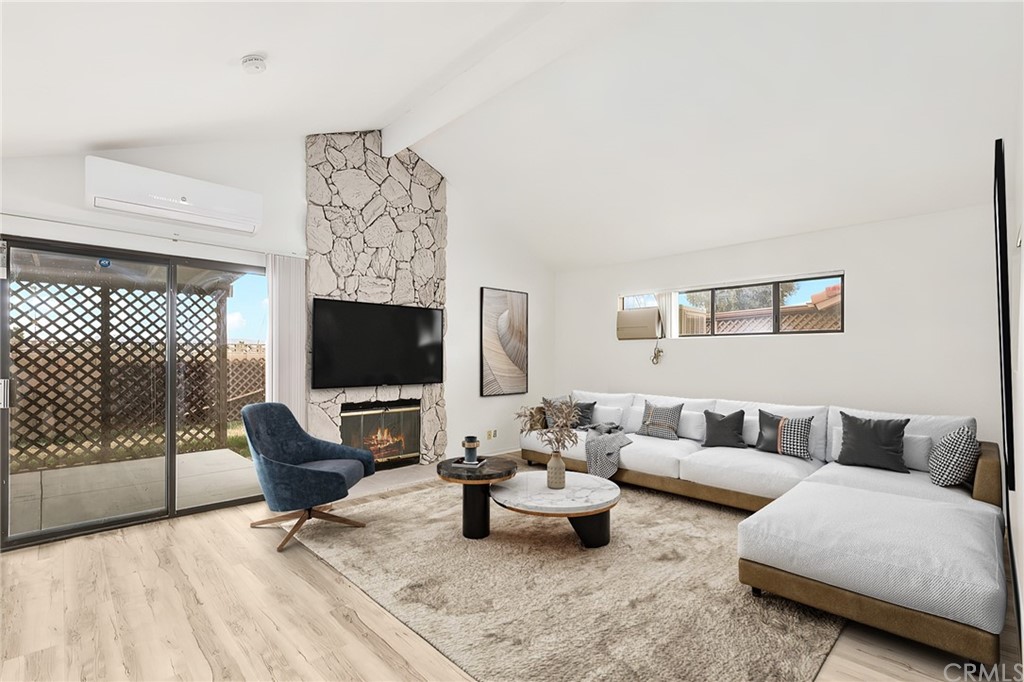 1467 Nolette Avenue Hemet, CA 92545 - Photo 2 of 10 a living room with furniture and a flat screen tv