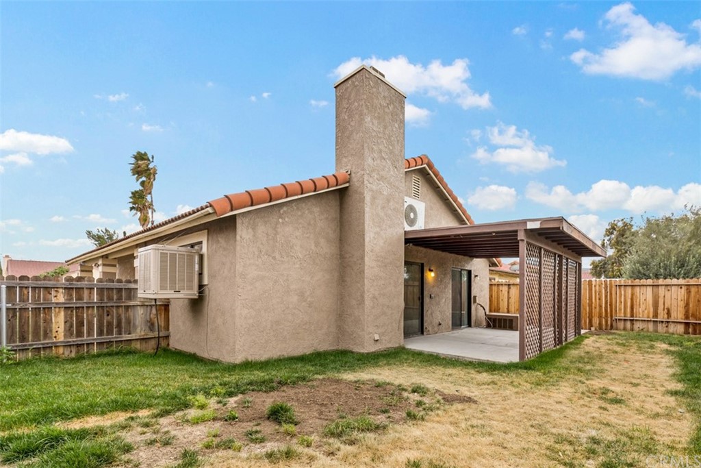1467 Nolette Avenue Hemet, CA 92545 - Photo 10 of 10 a view of a house with backyard and deck