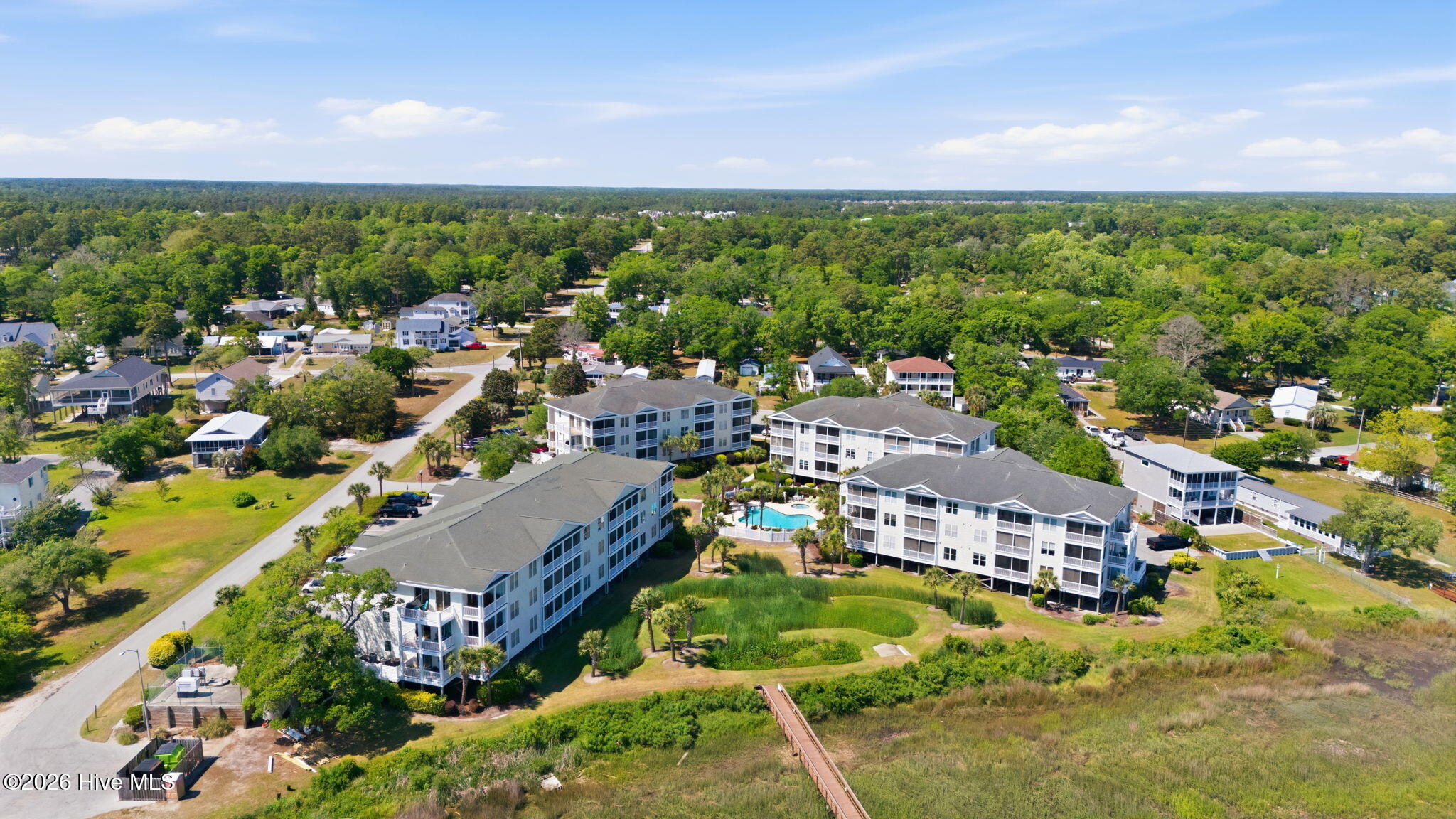 1135 Park Road Southwest, Unit 1203 Sunset Beach, NC 28468 - Photo 6 of 44 7-web-or-mls-DJI_20260504151259_0502_D