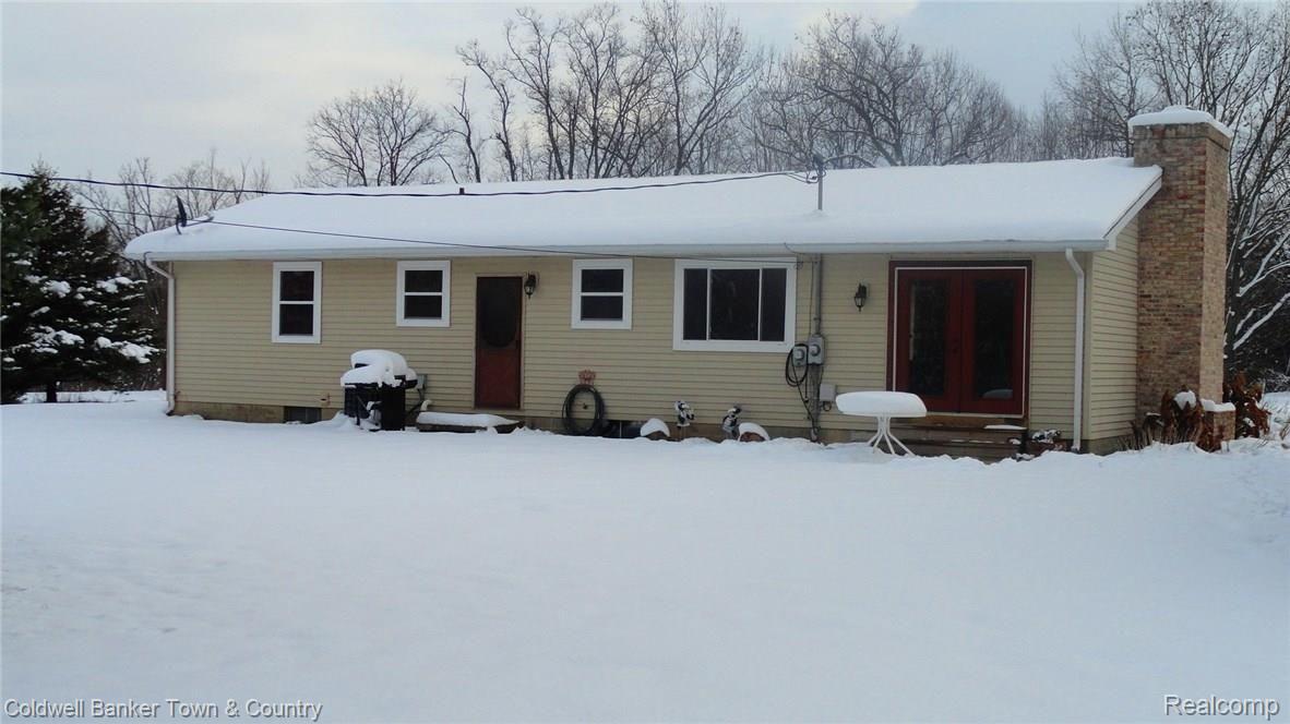 4696 North Nicholson Road Fowlerville, MI 48836 - Photo 30 of 42 Back of home.JPG