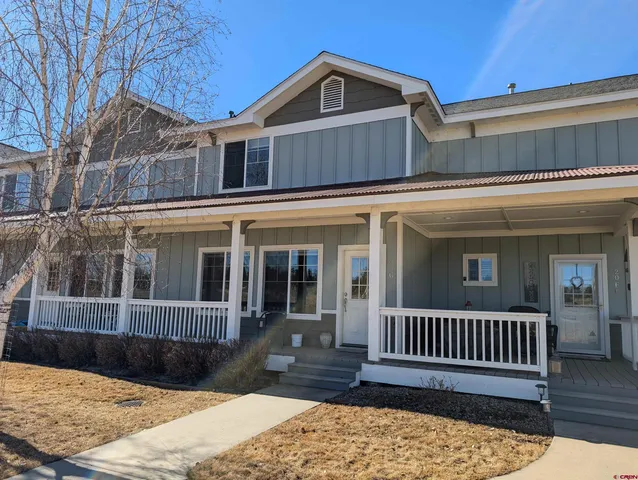 a view of a house with a fence