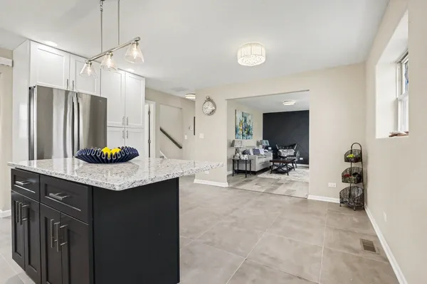 a view of living room and kitchen