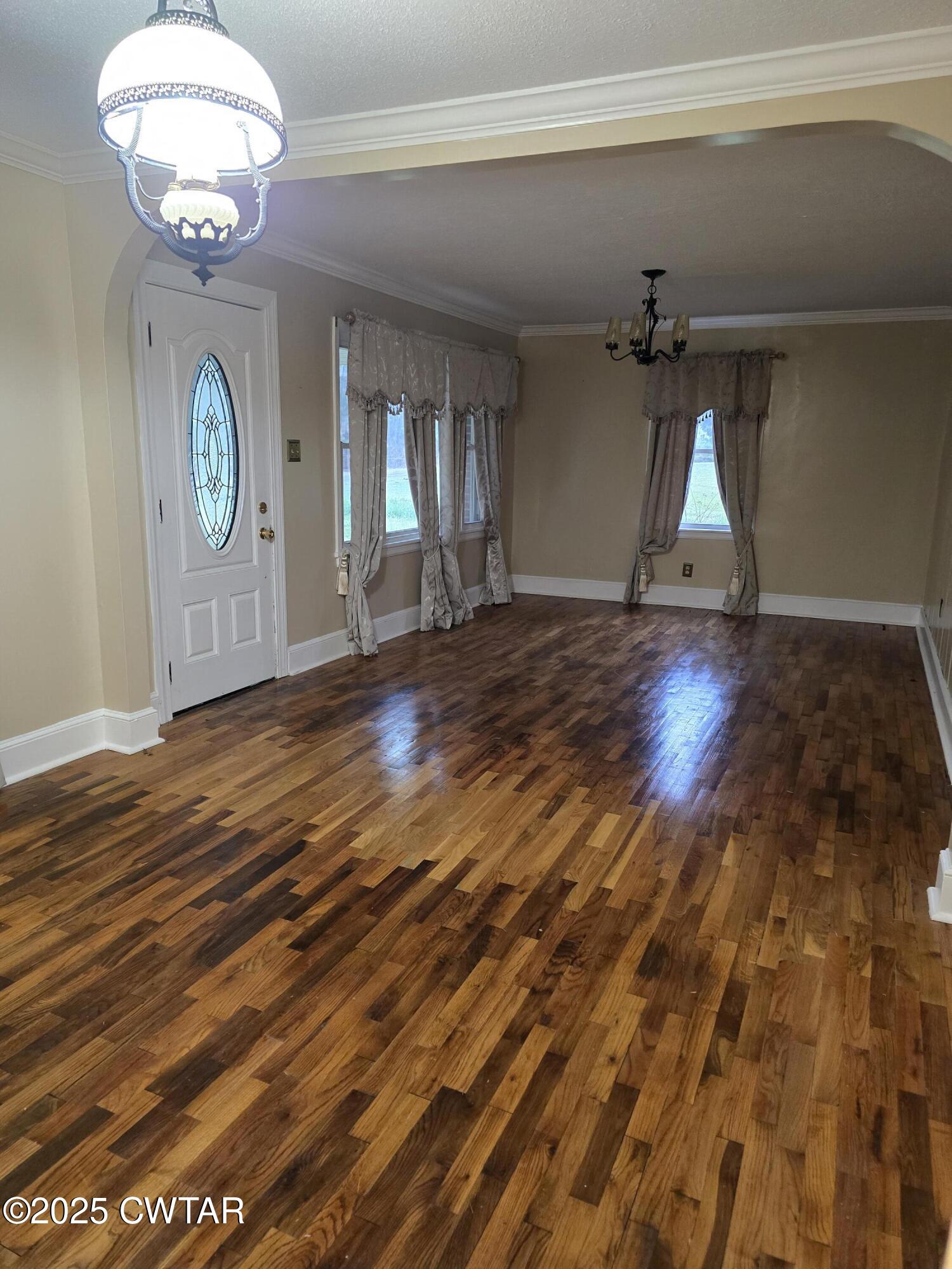 1719 Riverside Drive Jackson, TN 38301 - Photo 2 of 8 a view of room with wooden floor