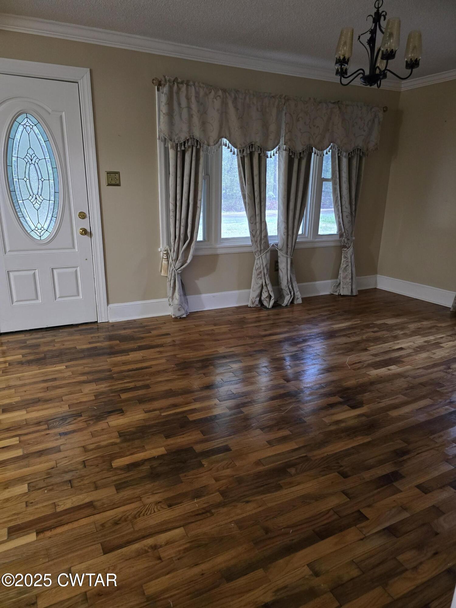 1719 Riverside Drive Jackson, TN 38301 - Photo 3 of 8 a view of entryway with wooden floor