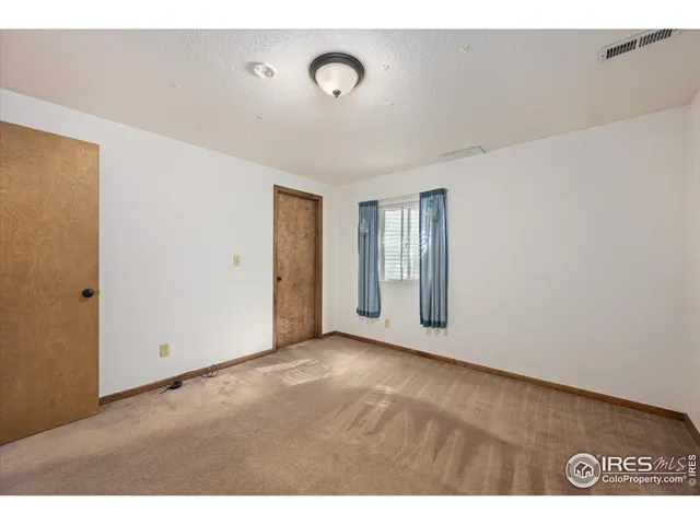 a view of an empty room with window