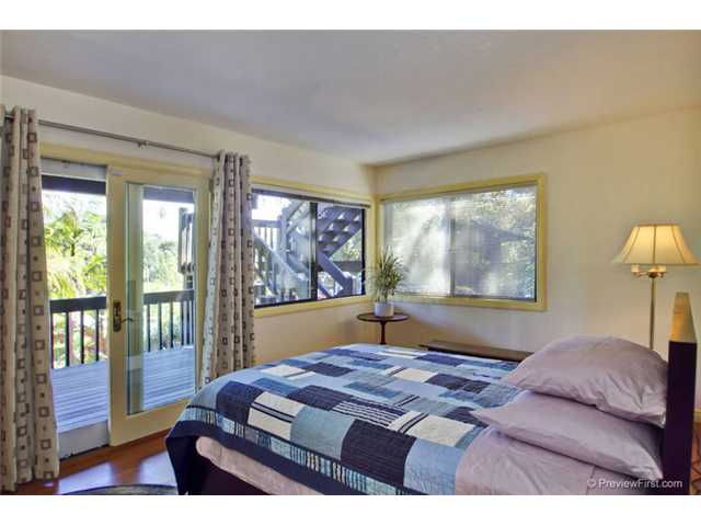 1247 Saxony Road Encinitas, CA 92024 - Photo 13 of 24 This bedroom opens to another complete bath, and a sitting area/office, with an enclosed porch.