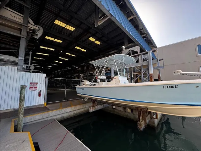 a view of a swimming pool with a chair