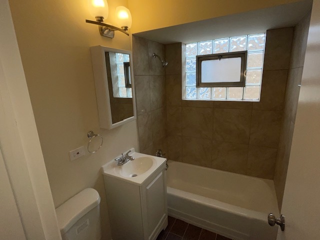 12312 South May Street Calumet Park, IL 60827 - Photo 6 of 11 a bathroom with a sink toilet and shower