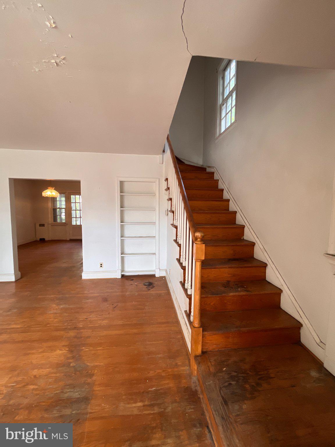 5906 Ayleshire Road Baltimore, MD 21239 - Photo 6 of 41 Entryway with classic hardwood staircase.