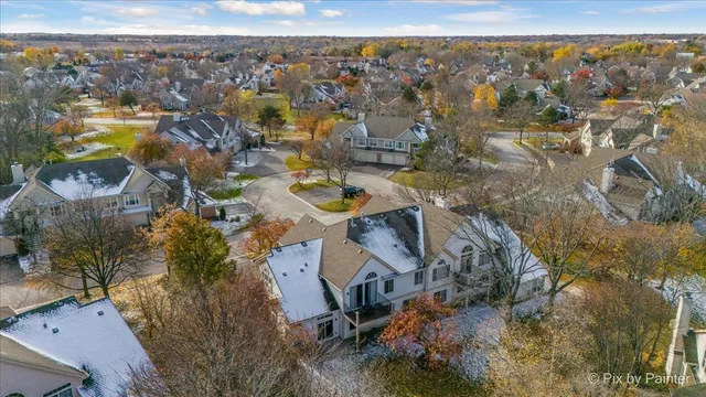 an aerial view of residential house with outdoor space