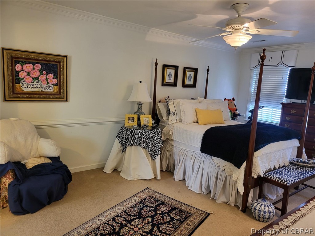 2449 Everglades Road Norfolk, VA 23518 - Photo 26 of 31 a bedroom with furniture and a chandelier