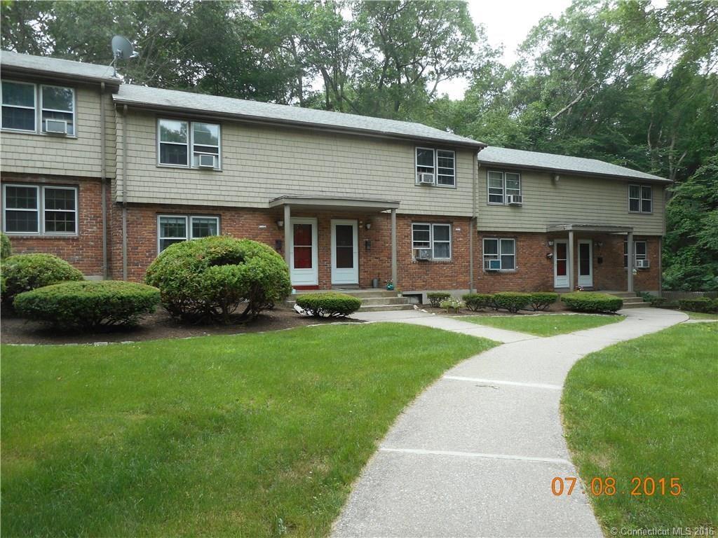 81 East Pattagansett Road, Unit 20 East Lyme, CT 06357 - Photo 1 of 1 a view of a house with a garden