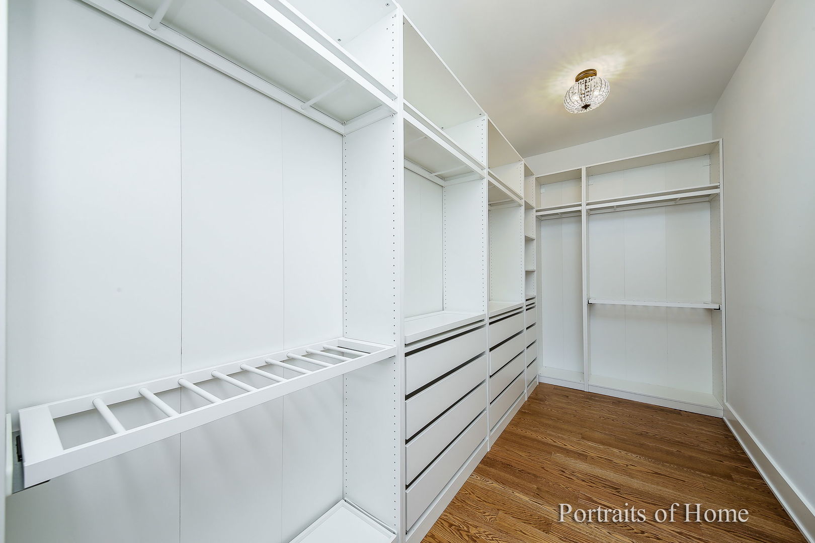 28W165 Geneva Road West Chicago, IL 60185 - Photo 16 of 20 a view of an empty walk in closet