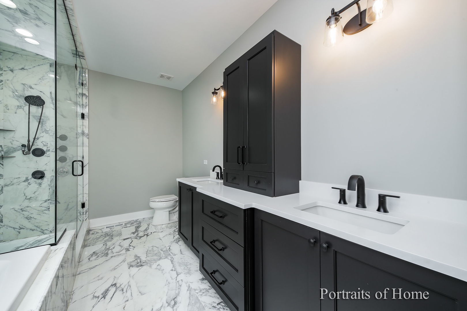 28W165 Geneva Road West Chicago, IL 60185 - Photo 9 of 20 a bathroom with a sink and a mirror