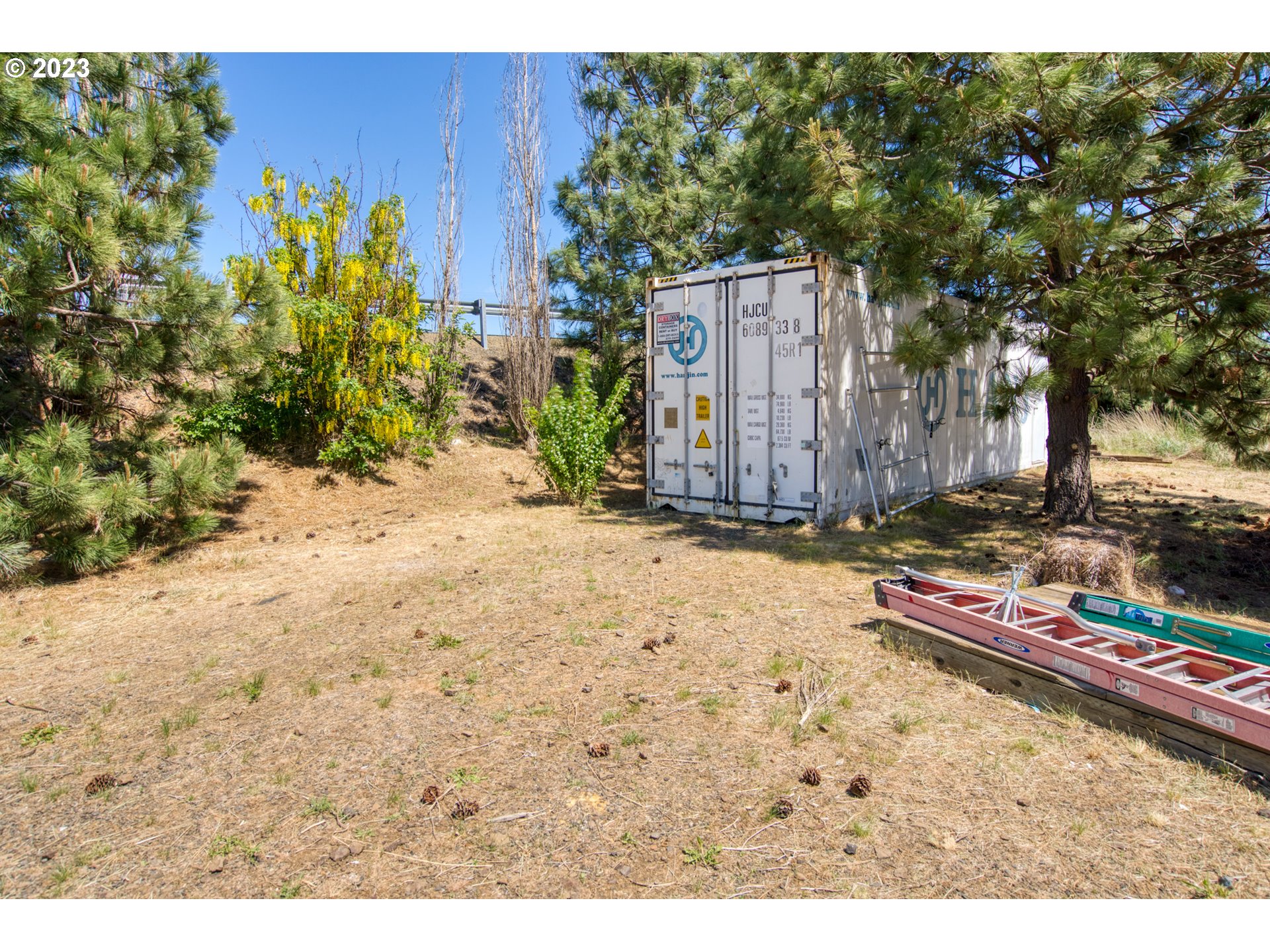 701 Dooley Road Centerville, WA 98613 - Photo 15 of 27 a backyard of a house with lots of green space