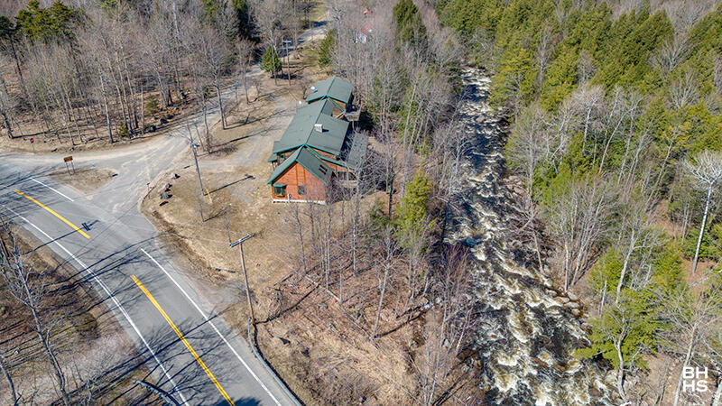 667 Days Mills Road St. Regis Falls, NY 12980 - Photo 50 of 51 HomeOnLakeOzoniaOutlet_A_Exterior_Side_R