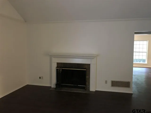 a living room with a fireplace