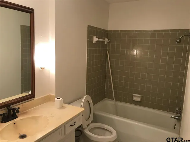 a bathroom with a sink and a bathtub