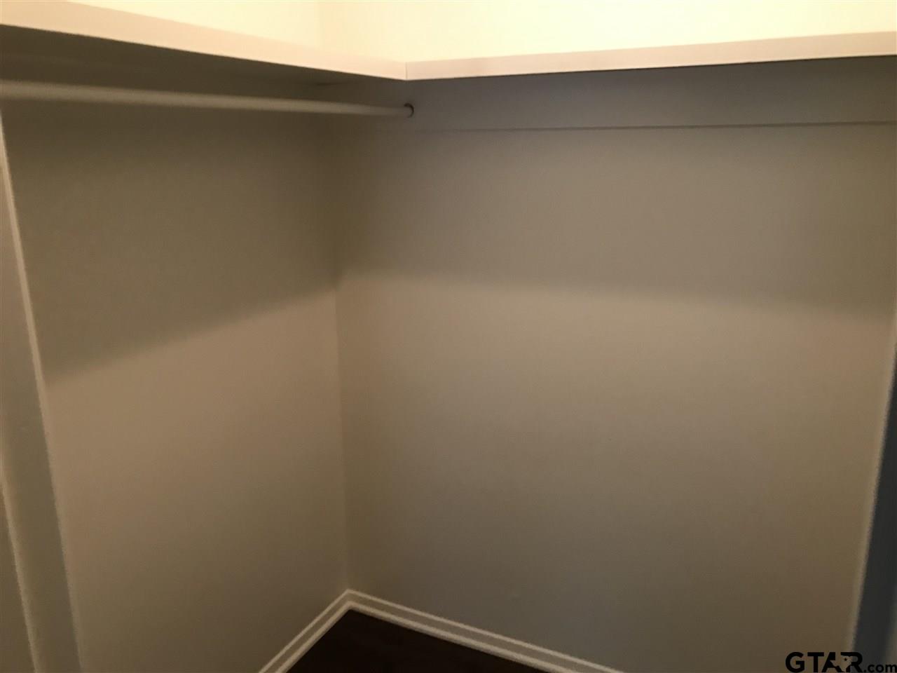 3721 Colony Park Drive Tyler, TX 75701 - Photo 10 of 11 a close up view of racks on the wall