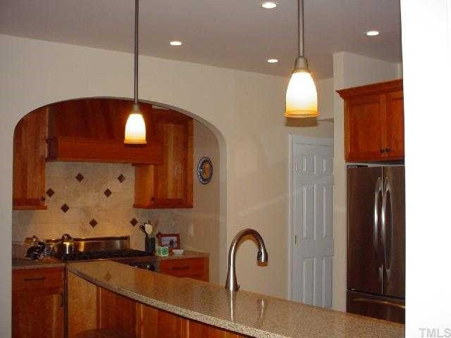 You have to come see this kitchen for yourself. Owner spent appx $80K on it. Top-of-the-line professional appliances. Instant hot water for all you cooking needs. No space is wasted. Gorgeous silestone counters. Modern pendant lighting. Kitchen
