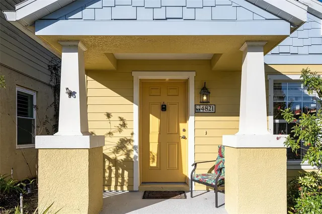 a front view of a house with many windows