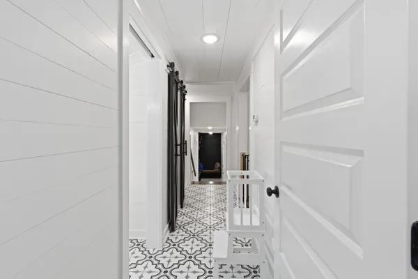 a bathroom with a tub and shower