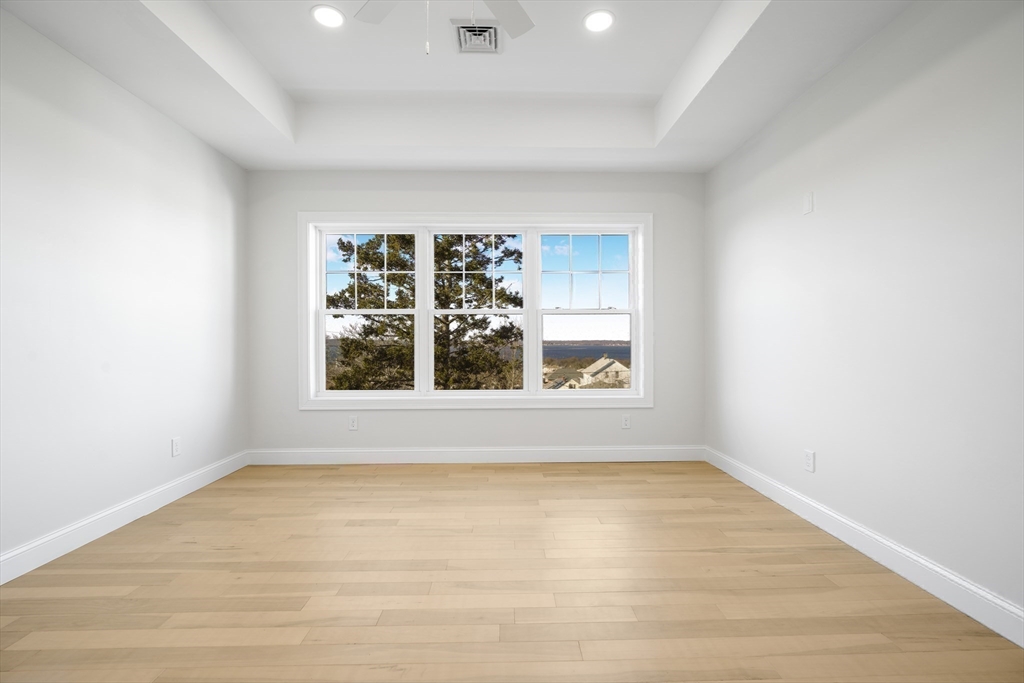144 Bailey Street Fall River, MA 02724 - Photo 19 of 37 wooden floor in a empty room