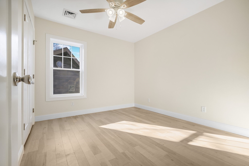 144 Bailey Street Fall River, MA 02724 - Photo 25 of 37 a view of an empty room with a window