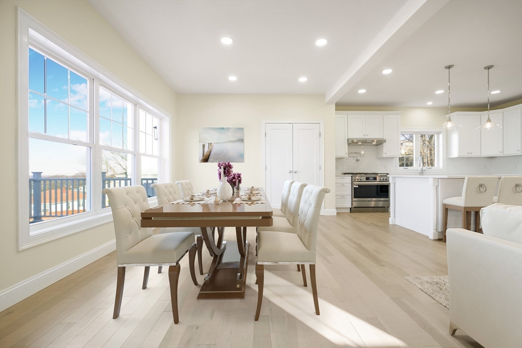 144 Bailey Street Fall River, MA 02724 - Photo 3 of 37 a view of a dining room with furniture and wooden floor
