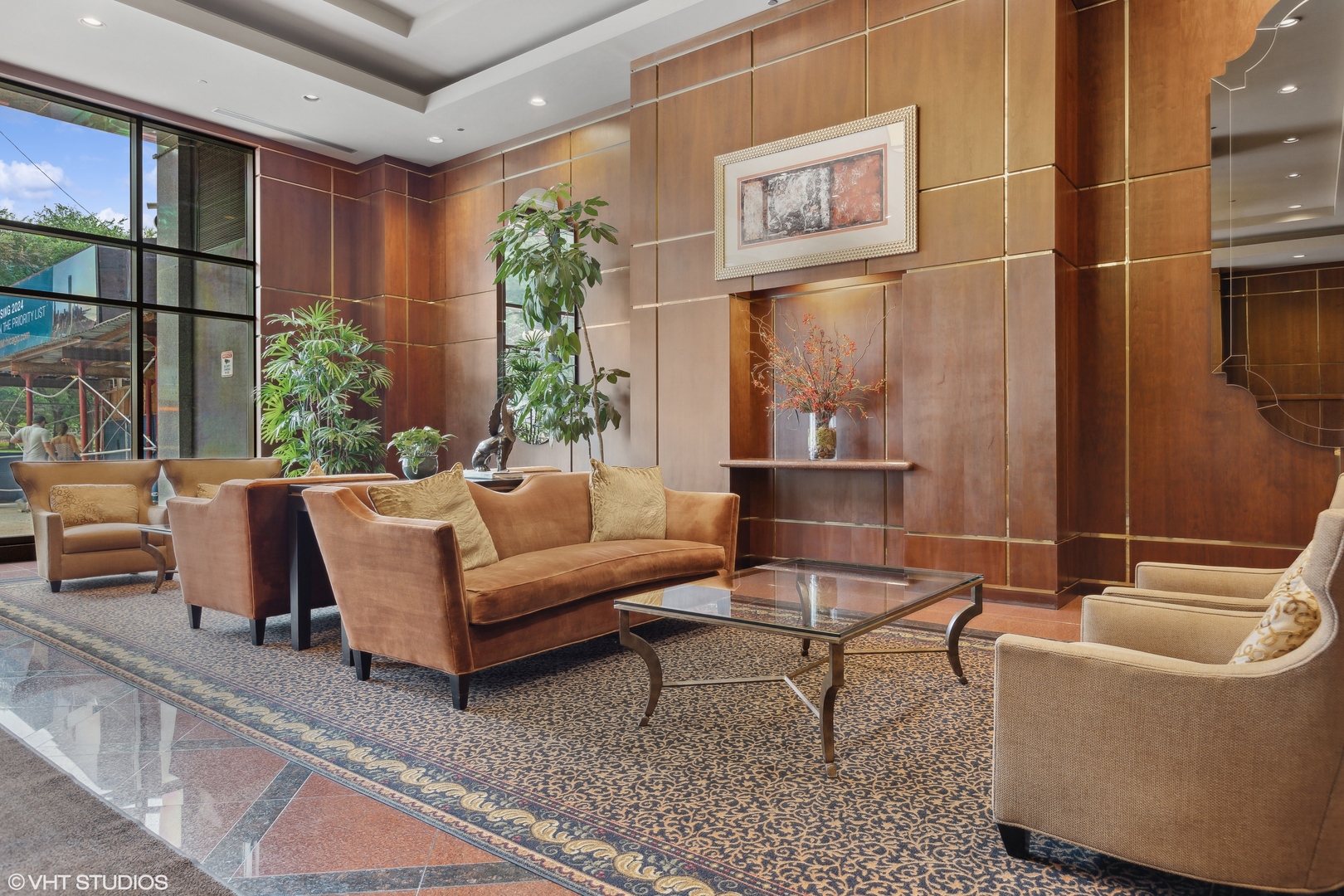 910 South Michigan Avenue, Unit 816 Chicago, IL 60605 - Photo 20 of 21 a living room with furniture and a window