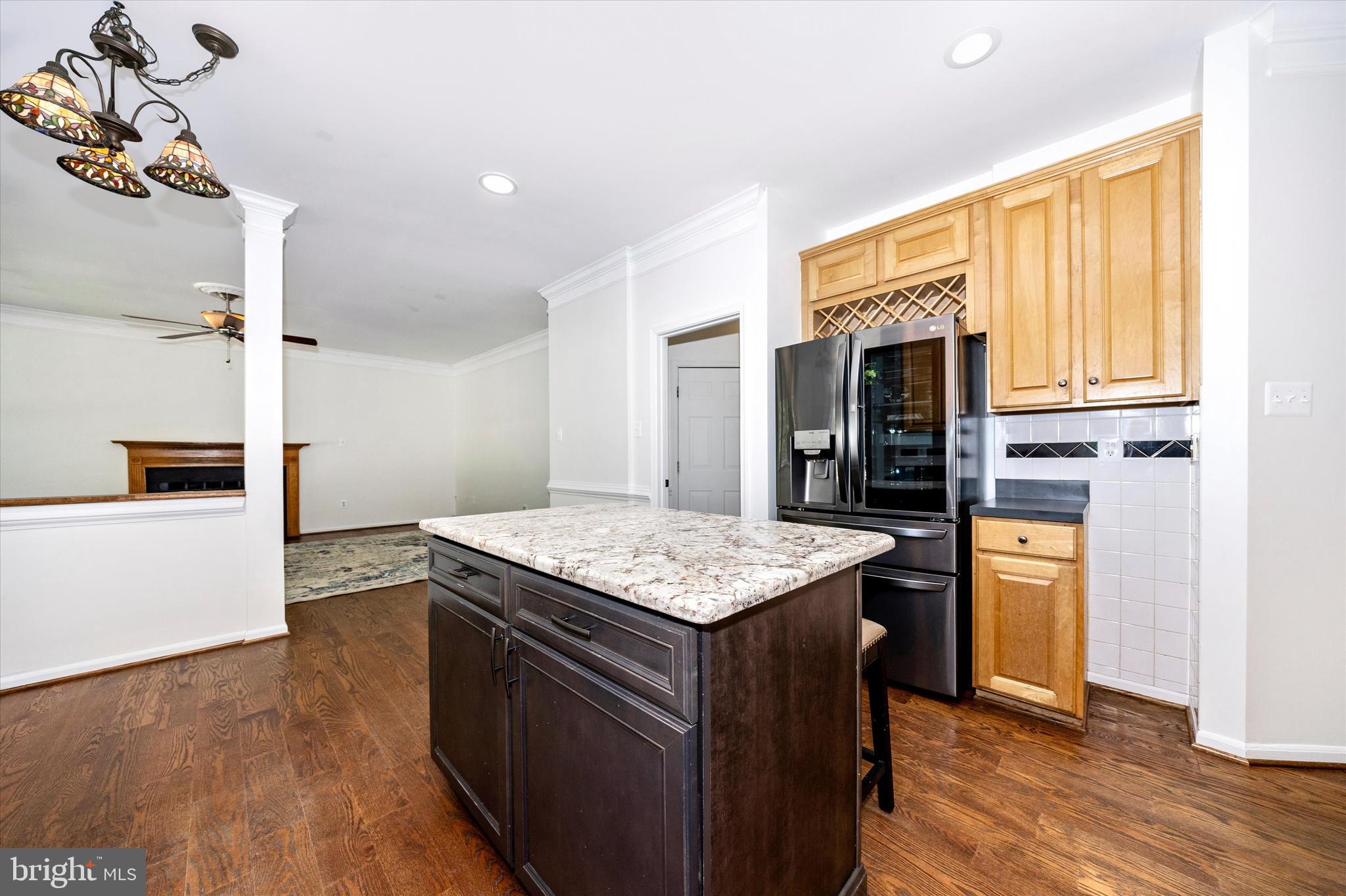 803 Apache Court Frederick, MD 21701 - Photo 9 of 46 a kitchen with stainless steel appliances granite countertop a stove and a refrigerator