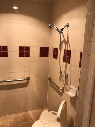 a bathroom with a sink and mirror