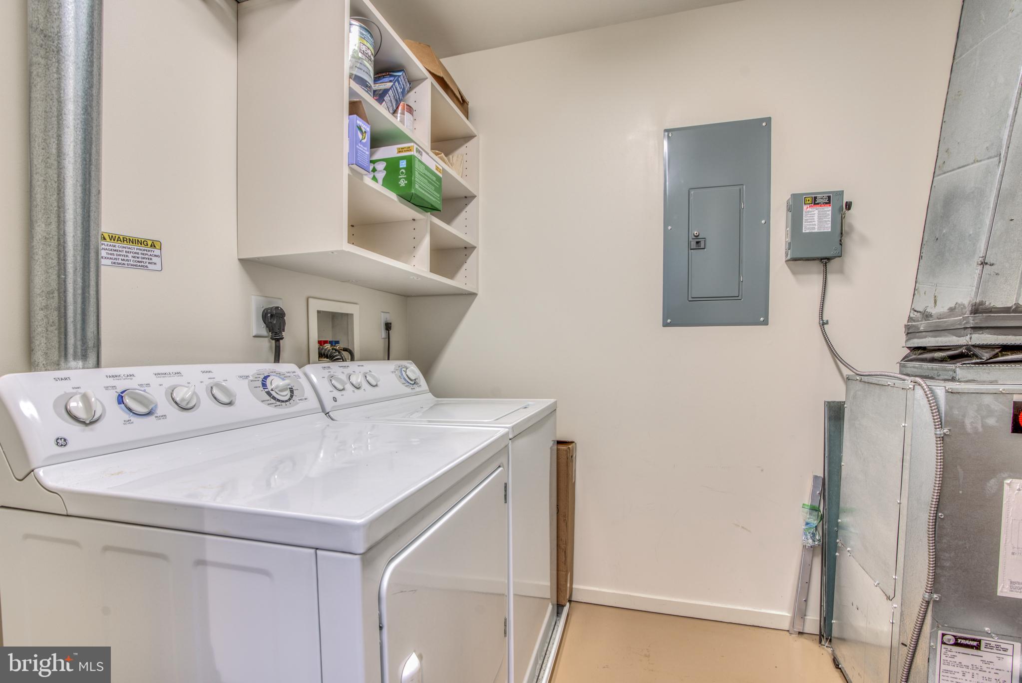 1200 Steuart Street, Unit 430 Baltimore, MD 21230 - Photo 20 of 53 Laundry room with space for storage.