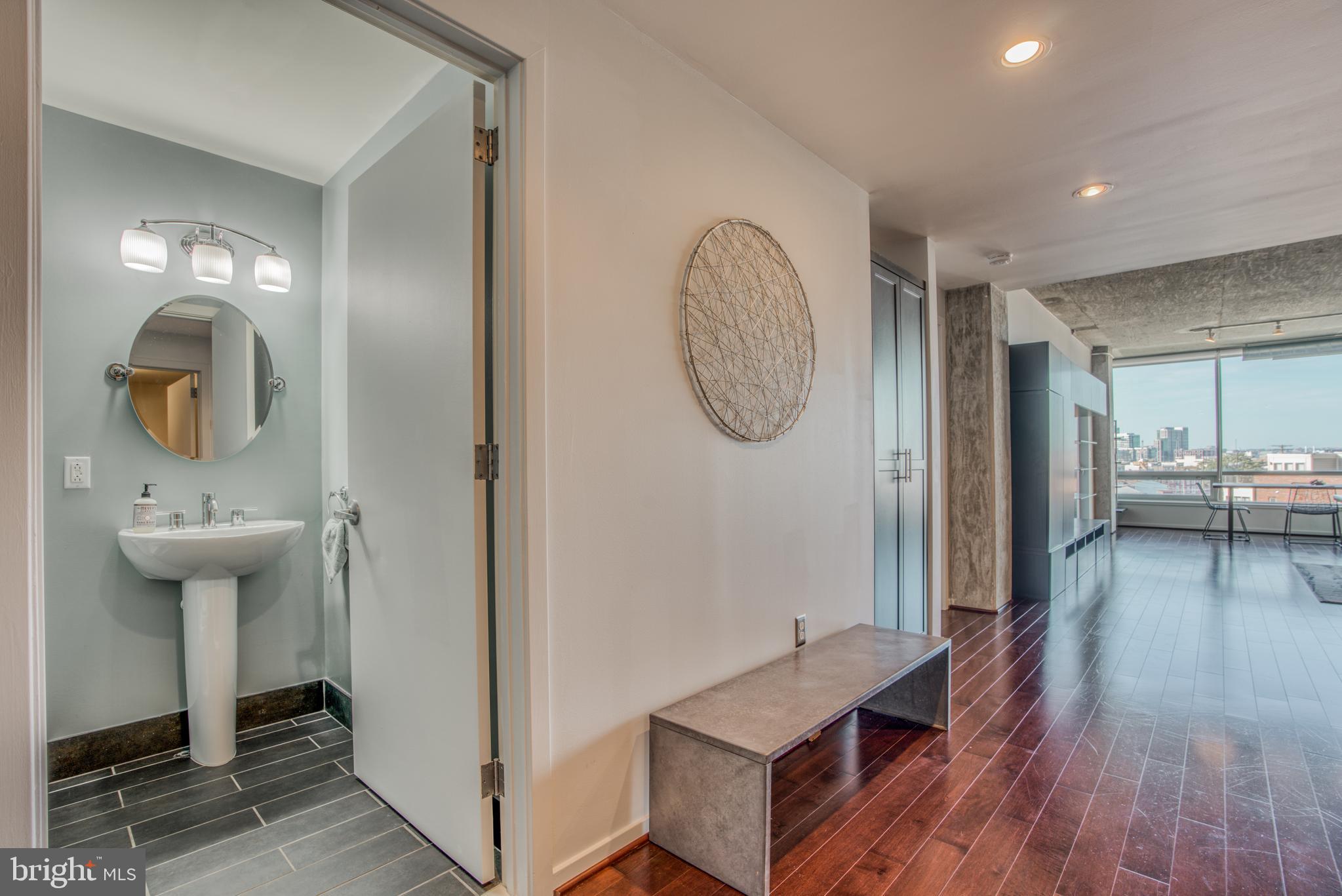 1200 Steuart Street, Unit 430 Baltimore, MD 21230 - Photo 4 of 53 Guest bath off entrance hall