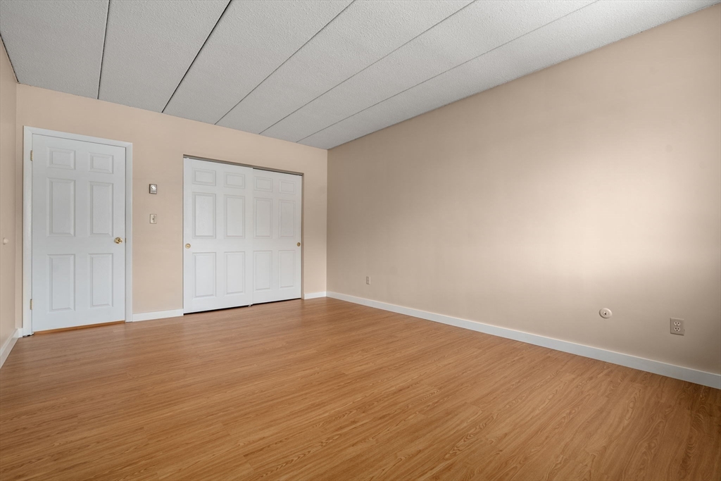90 High Street, Unit 309 Dedham, MA 02026 - Photo 15 of 20 a view of an empty room