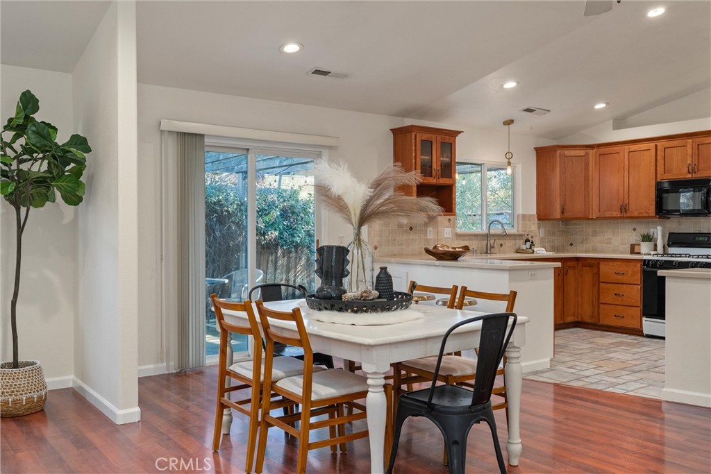 3 Cardiff Court Chico, CA 95973 - Photo 12 of 25 a dining room with furniture and wooden floor