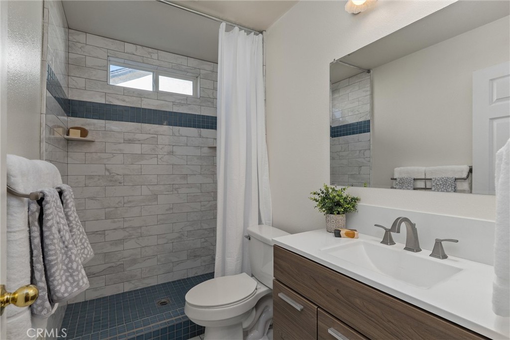 3 Cardiff Court Chico, CA 95973 - Photo 17 of 25 a bathroom with a sink a toilet and shower